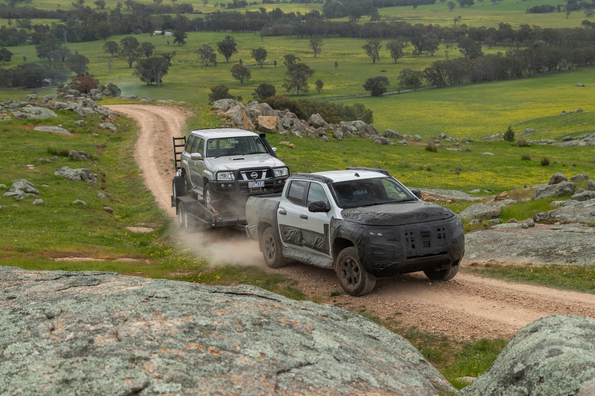 The 2025 Nissan Navara towing a Land Cruiser. Nissan leaned on Premcar for expertise to boost Rear Axle limits