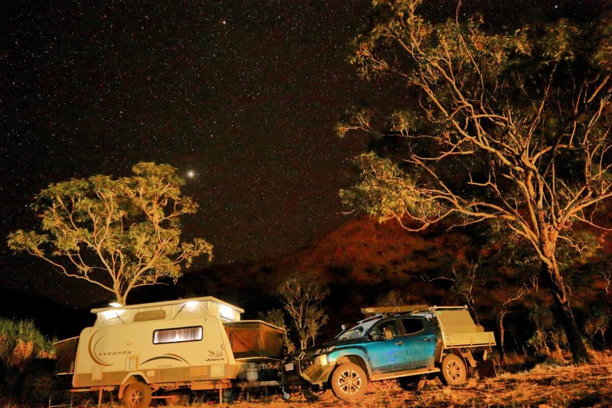Night shot of a Jayco and Mitsubishi Triton peacefully camped up at the Wuggubun Aboriginal Community Campground