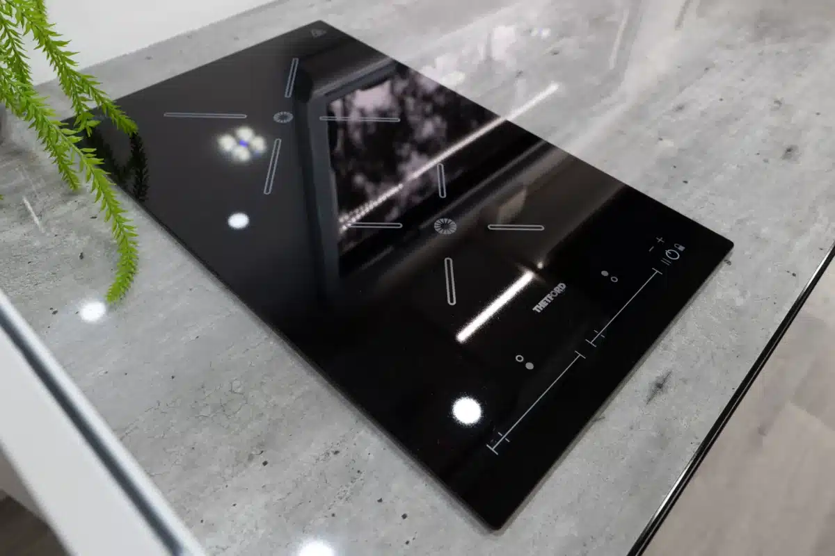 Induction cooktop in the Paradise Independence Platinum motorhome kitchen