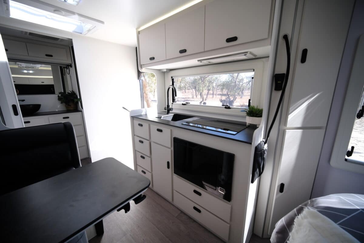 Enjoying views of the campsite from the JB Gator X ev. JB installs a full deck of drawers just near the front door by the entry