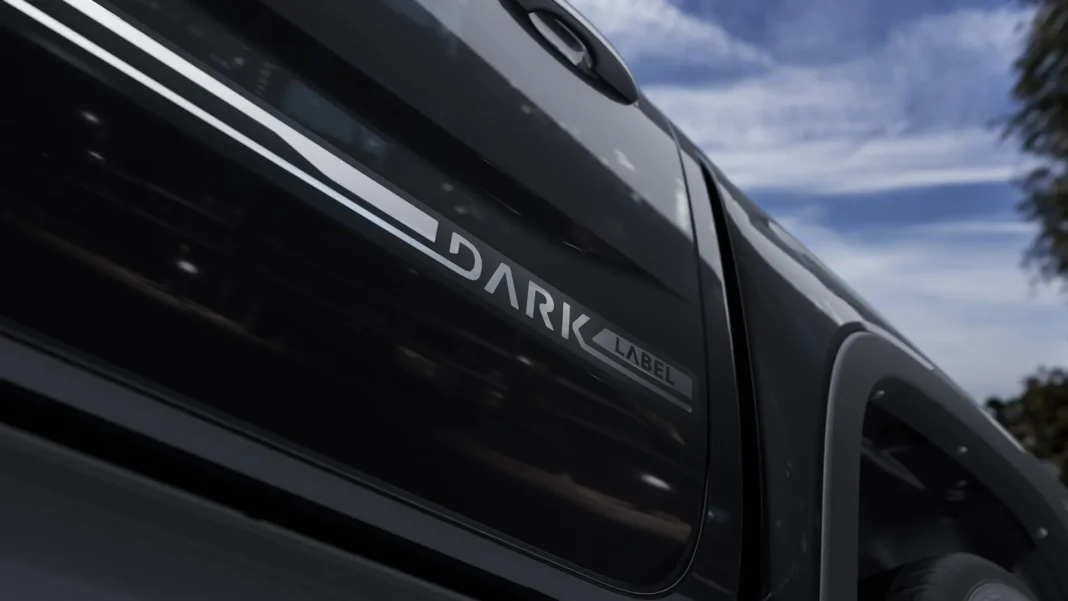 2026-volkswagen-amarok-dark-label-badge Dark Label badge on the exterior of the 2026 Volkswagen Amarok
