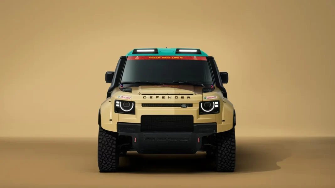 Front view of Land Rover Defender Dakar Rally D7X-R competing in desert rally conditions