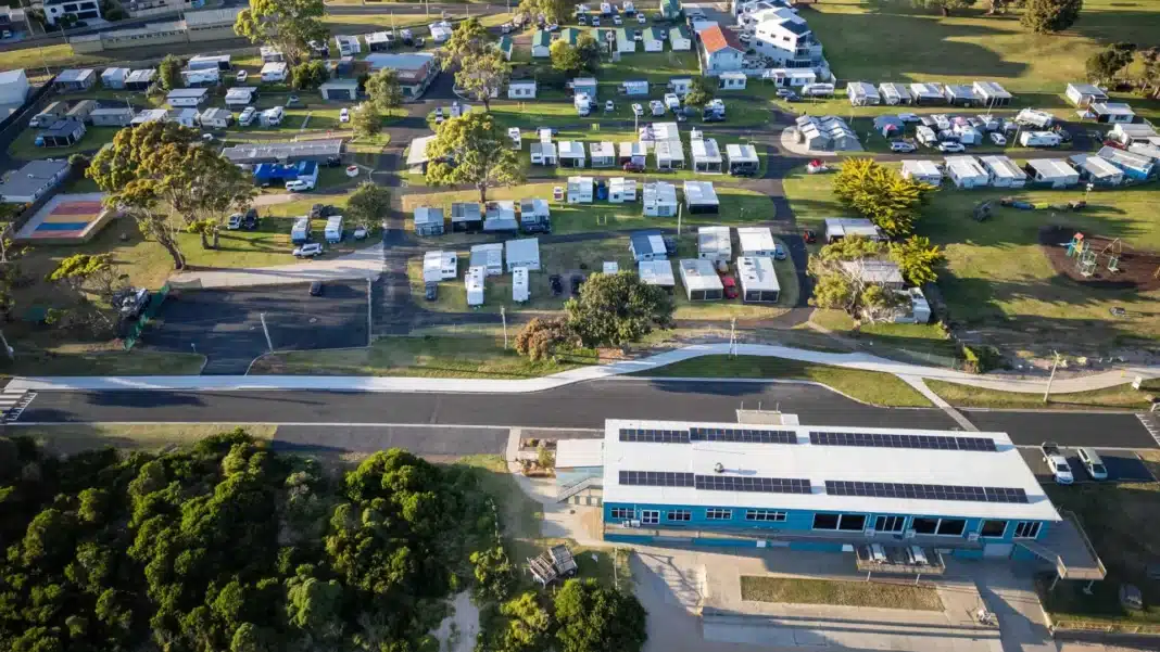 Aerial view of closely spaced sites at a busy Australian holiday park