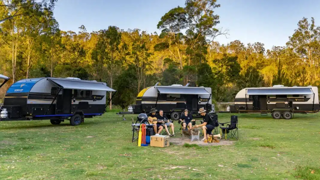 Caravan camping set up at an Australian campground Caravans and campers set up at an Australian campground