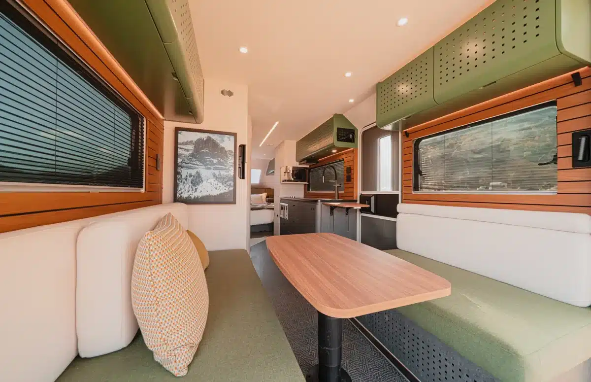 Dinette and kitchen area inside the Evotrex PG5 RV trailer