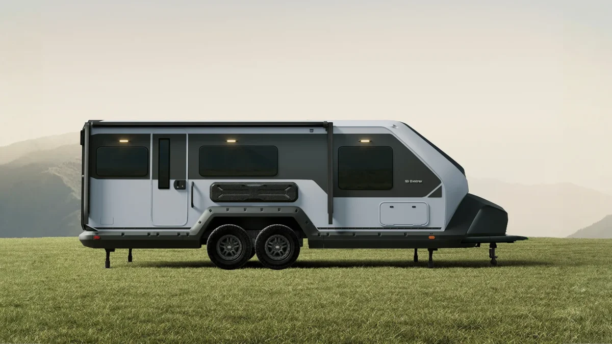 Side profile of the Evotrex PG5 RV trailer showing entry door and body layout