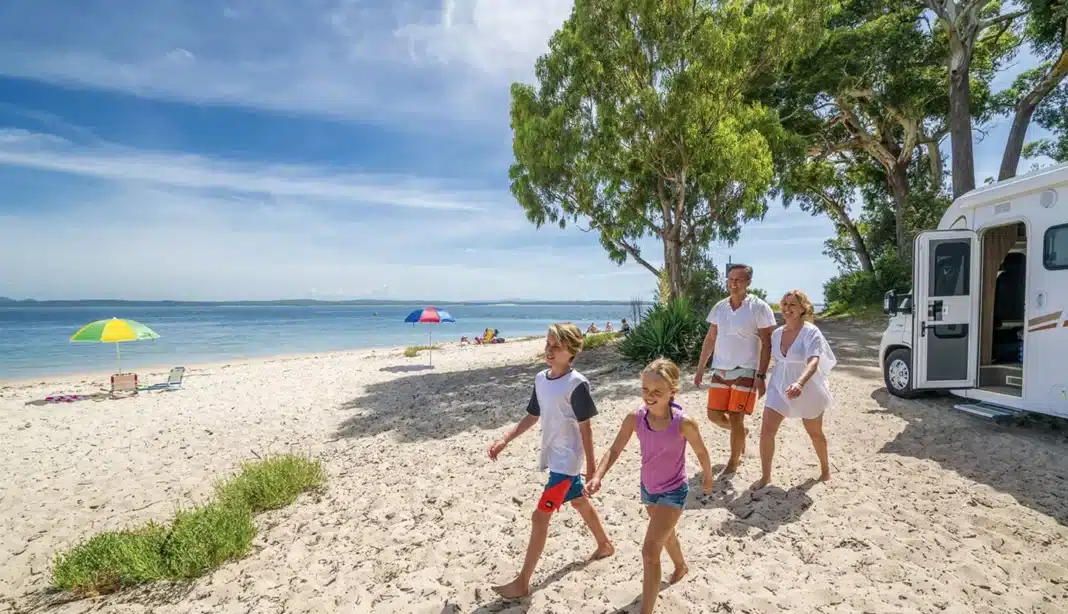 Family enjoying a summer caravan holiday on the Australian coast