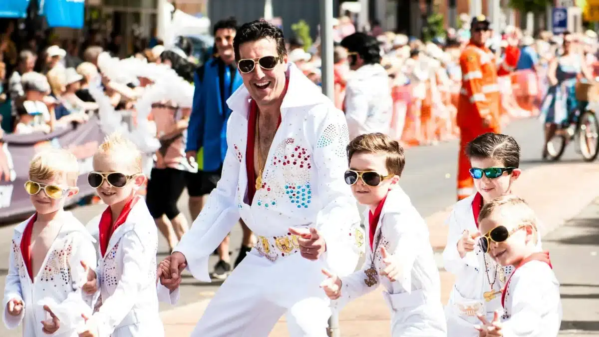 Performers dressed as Elvis during the Parkes Elvis Festival street parade