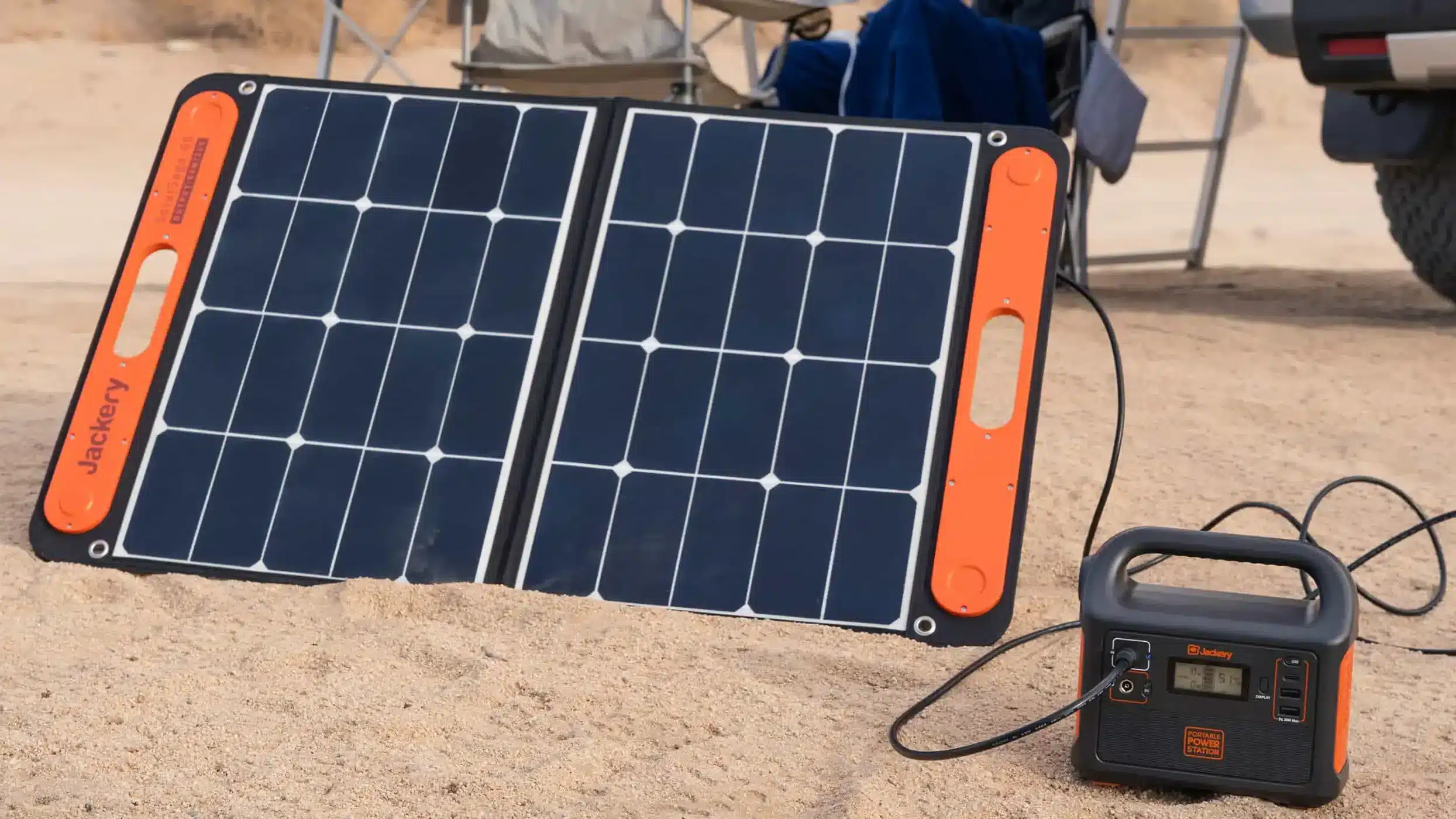 portable solar panels charging a small portable battery