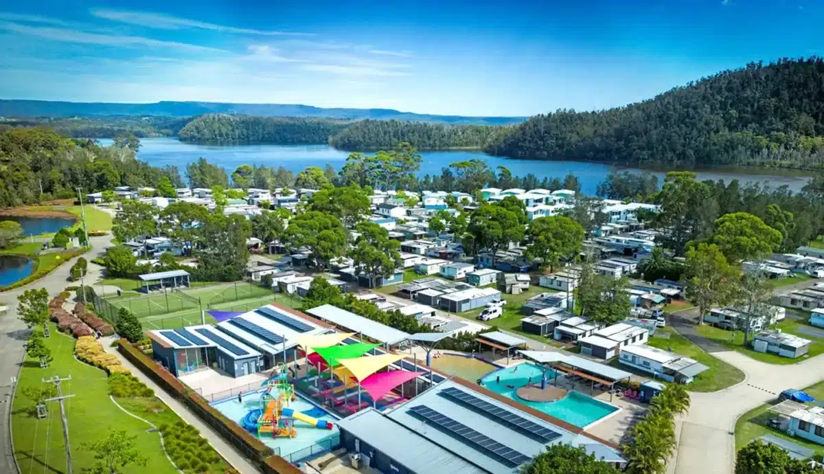 Aerial view of a busy regional caravan park in Australia during summer