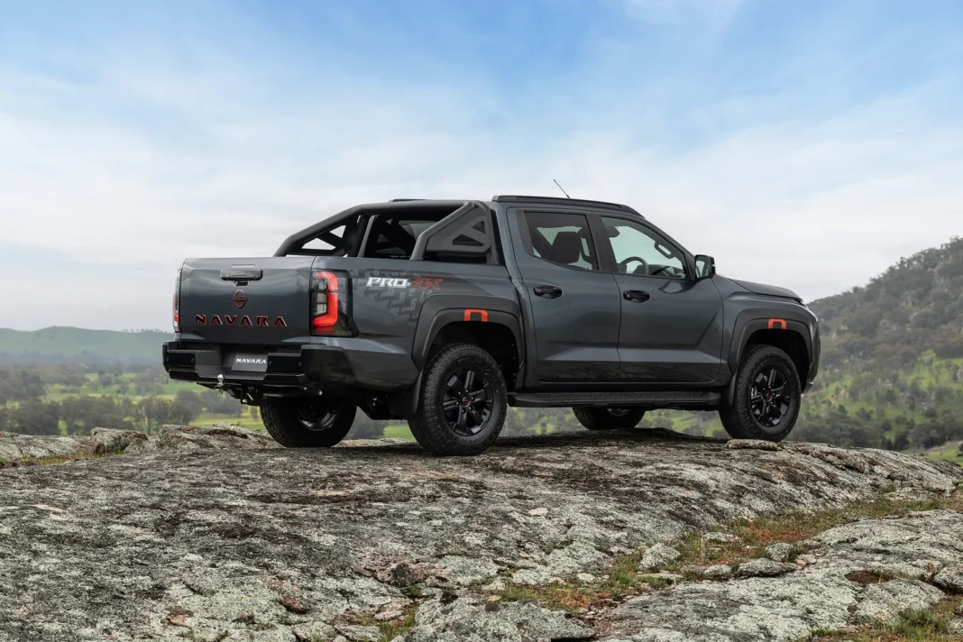 2026 Nissan Navara PRO-4X side profile on rocky terrain