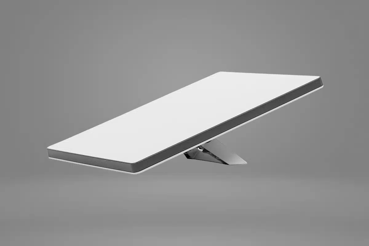 Starlink Mini satellite dish on integrated kickstand against a neutral studio background