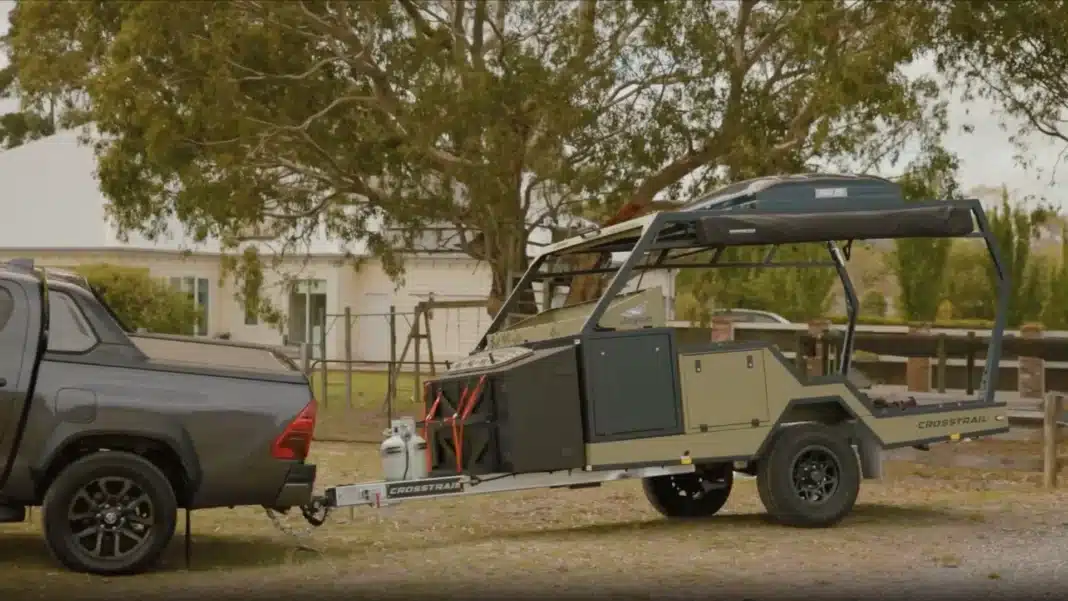 Compact camper trailer towed in a rural setting, reflecting evolving caravan design for modern travellers