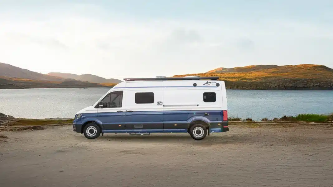 Jayco campervan parked beside a remote Australian waterway during a regional road trip