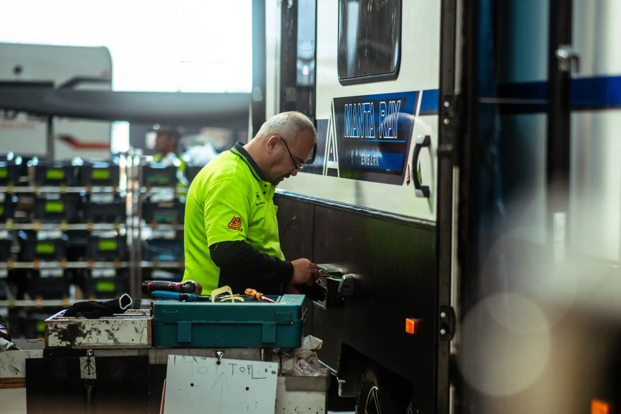 Man working on caravan