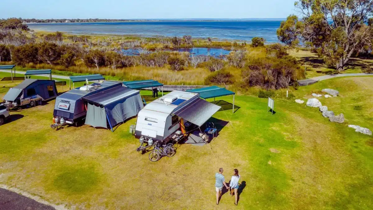 Travellers set up at a regional Australian caravan park