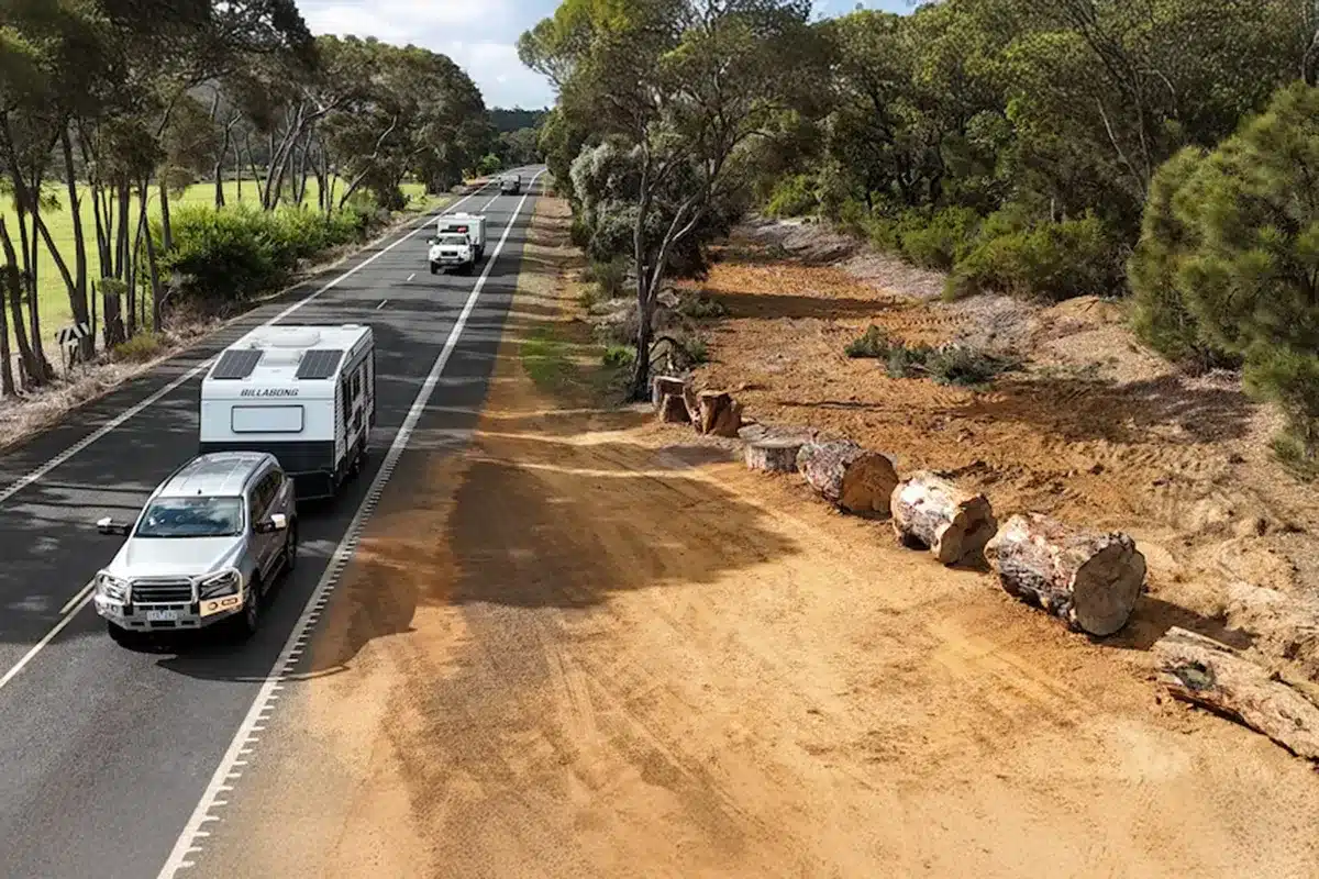 Caravan pulled over at roadside rest area along regional Australian highway