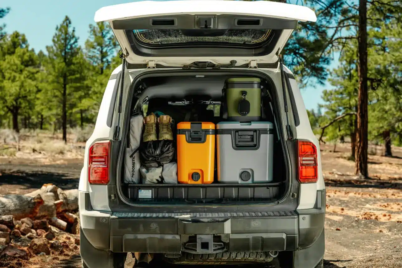 Dometic Recon hardside cooler with modular stackable design in boot/trunk of car