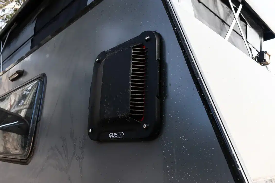 slim dust reduction system on side of dirty rv camper