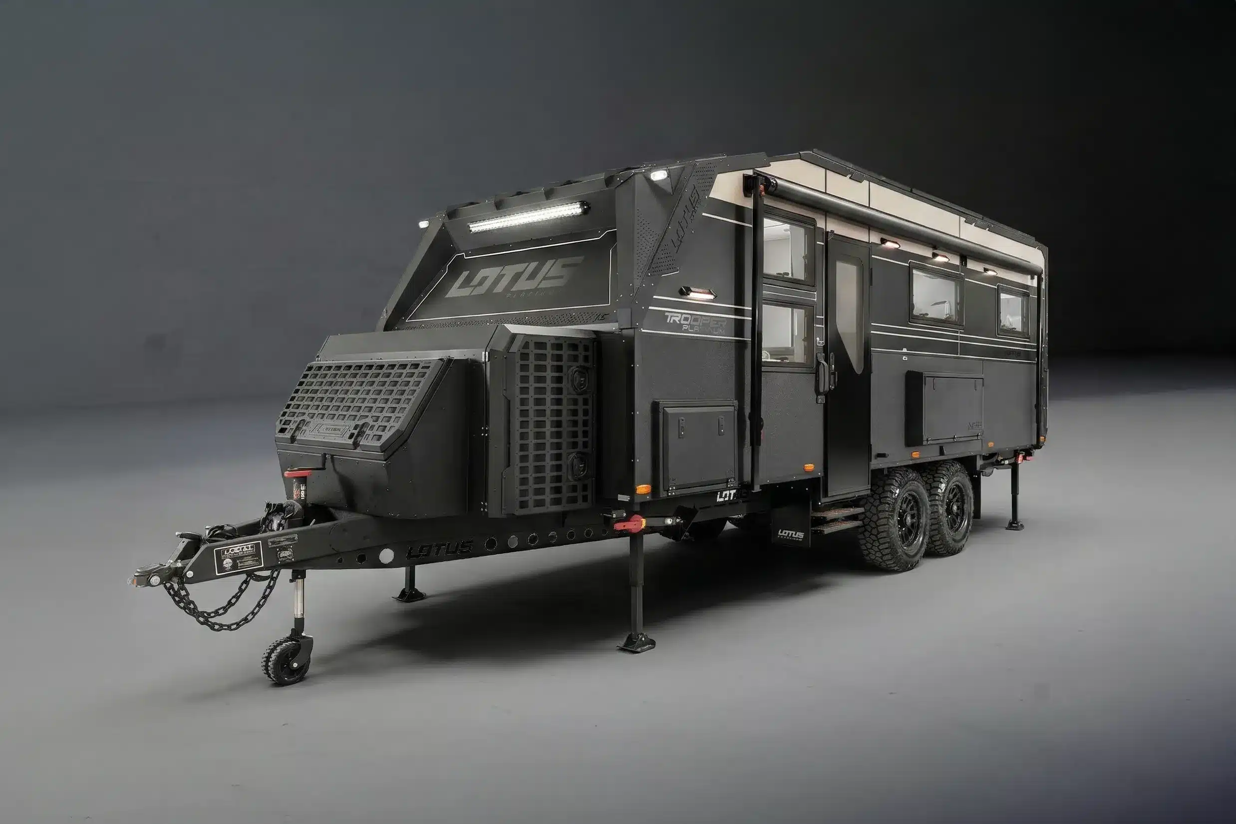 a preview look at the 2026 Lotus Caravans Trooper Platinum model, in a moody studio suiting the vibe of the caravan style and design
