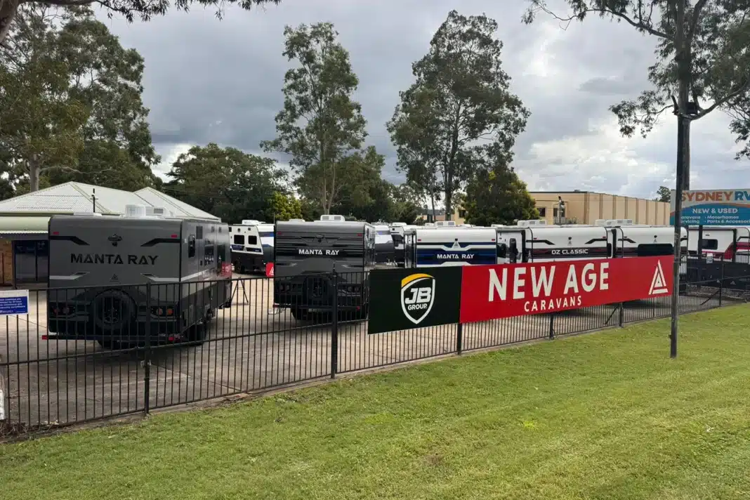 New Age Caravans display yard at Sydney RV Penrith with multiple caravan models lined up.