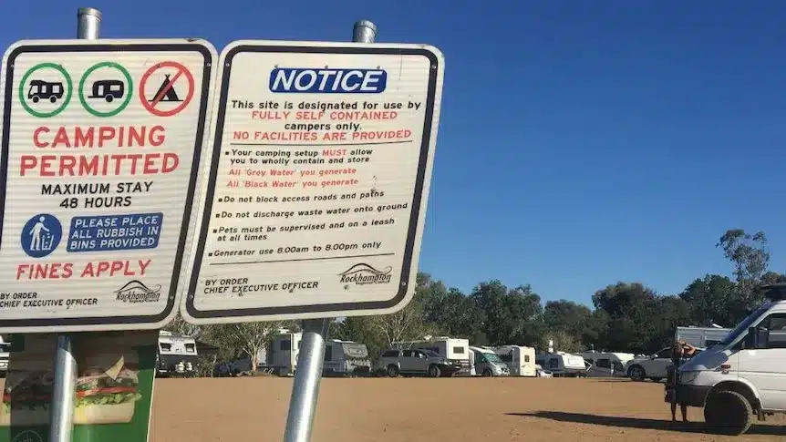 camping_sign_rules sign showing camping caravanning rules in rural australia