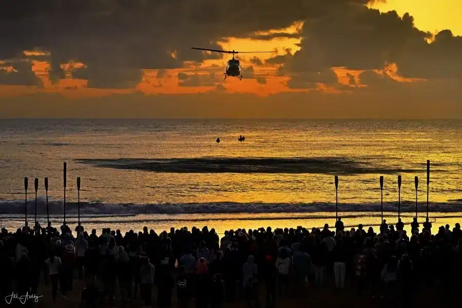 terrigal beach anzac day dawn service surfboats and helicopter flying over