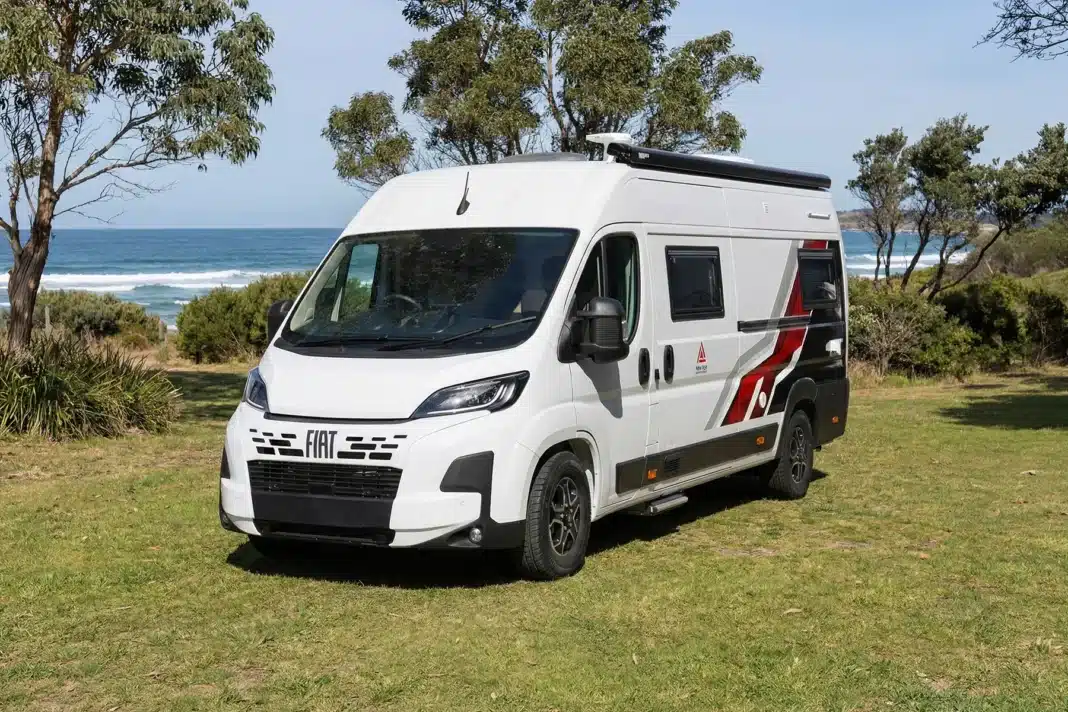 Campervan on grass in a coastal campsite australia