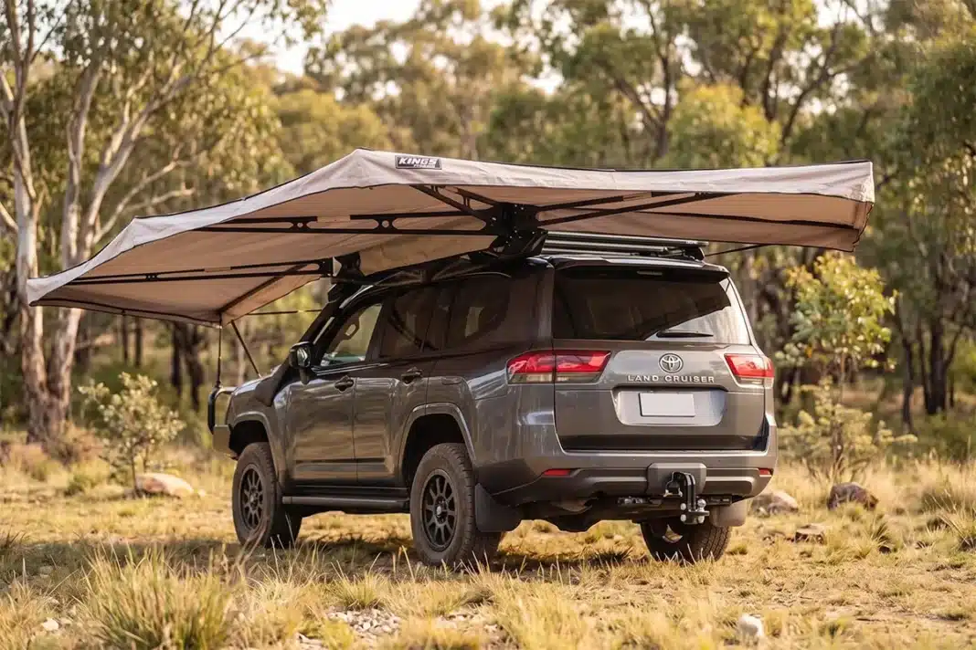Adventure Kings 270 freestanding awning deployed over a Toyota LandCruiser at a bushland campsite