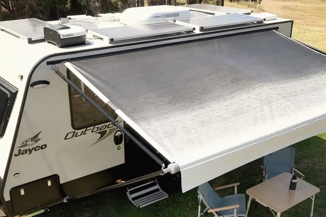 dometic-anti-flap-kit-above-2 Overhead view of a Jayco Outback caravan with Dometic anti-flap kit tensioning the awning rafter arms against the roof rail