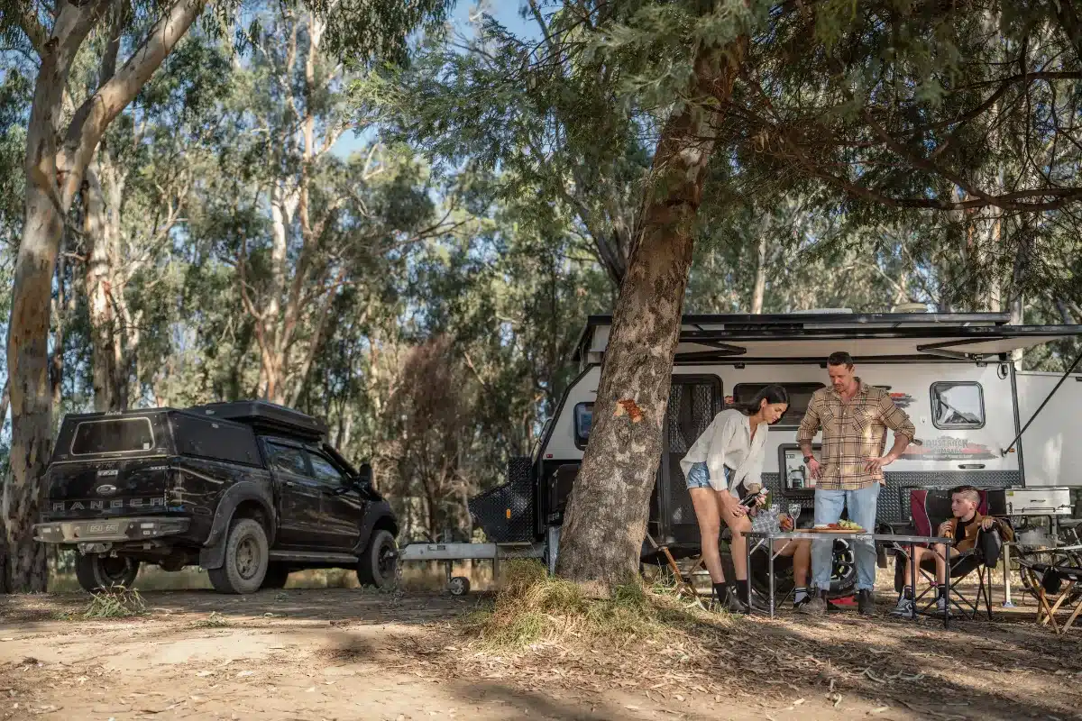 family caravanning echuca murray river with car