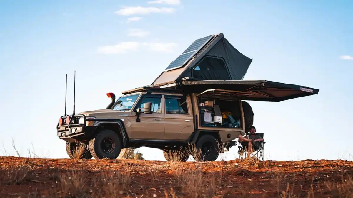 remium 270 degree awning deployed over a Toyota LandCruiser 79 Series at an outback campsite