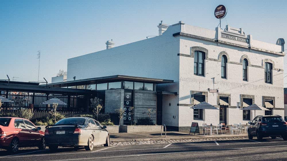 best dining ballarat western hotel with cartlon draught sig and cars parked out from 
