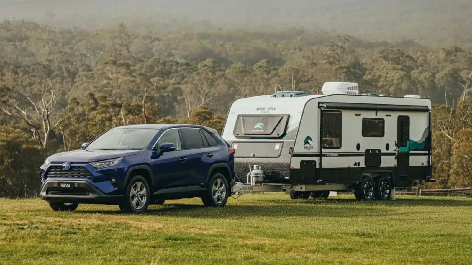 Toyota RAV4 hybrid towing a caravan through Australian bushland