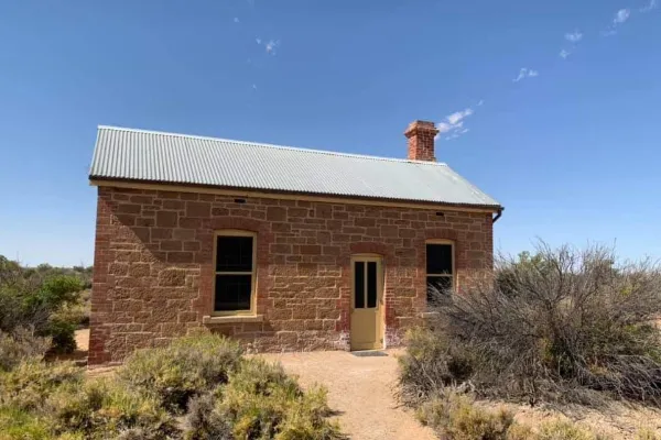 Historic sandstone railway cottage at Coward Springs on the Oodnadatta Track outback SA