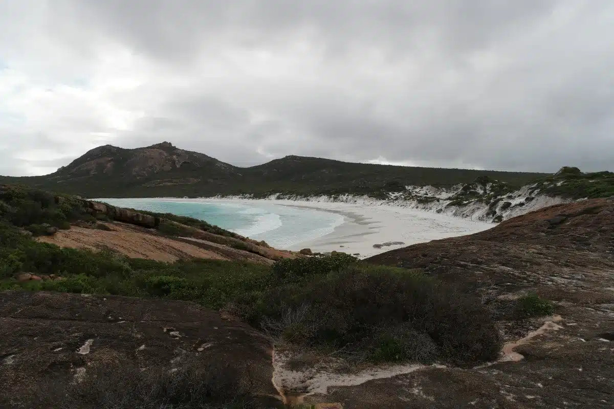 White sand beach and turquoise water between granite headlands at Cape Le Grand National Park, Western Australia