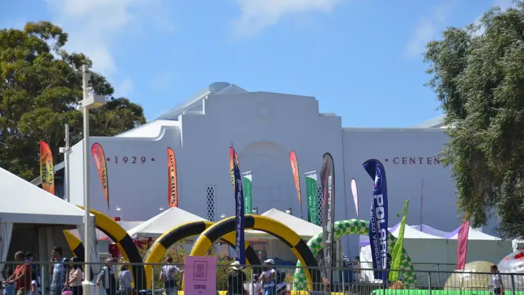 Exhibitor flags and marquees outside the 1929 Centenary Pavilion at Claremont Showground in Perth during a show