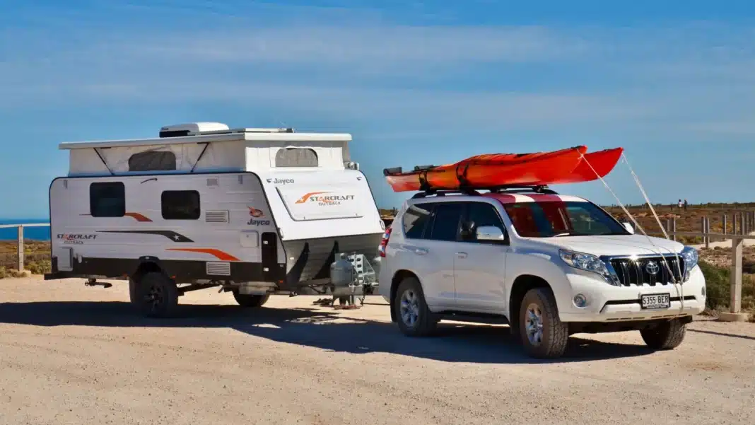 Prado and Jayco on the Nullarbor Toyota LandCruiser Prado hitched to a Jayco Starcraft Outback pop-top caravan at a Bunda Cliffs lookout on the Nullarbor